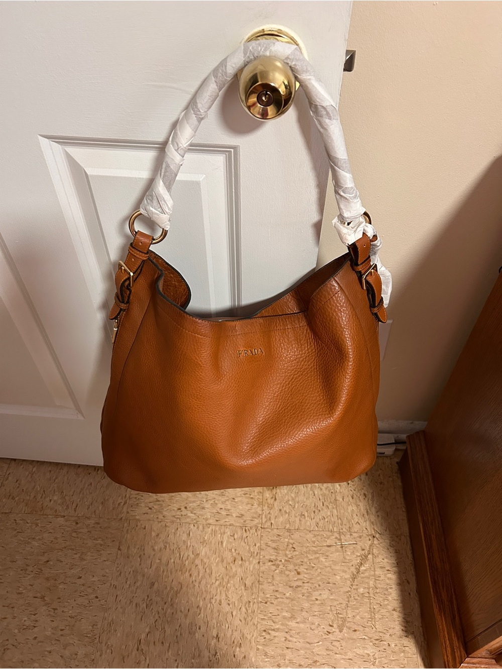 PRADA Cognac Leather Hobo Bag with Gold Hardware